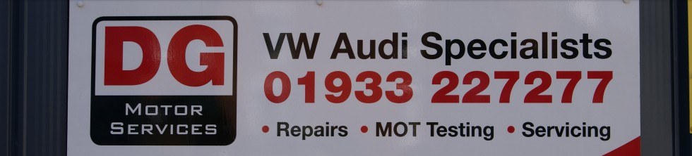 DG Motor Services sign: VW Audi Specialists, repairs, MOT testing, servicing